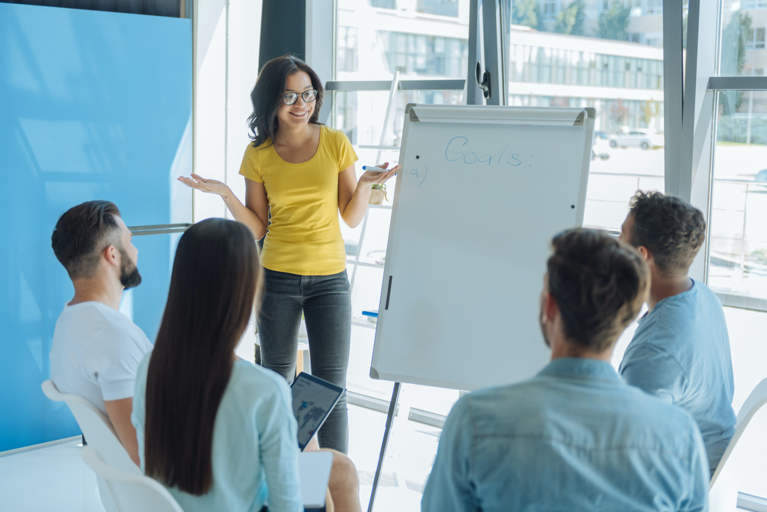 Delighted positive woman conducting a seminar Delighted positive woman conducting a seminar